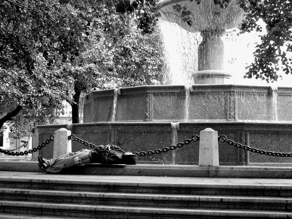Asleep at the fountain